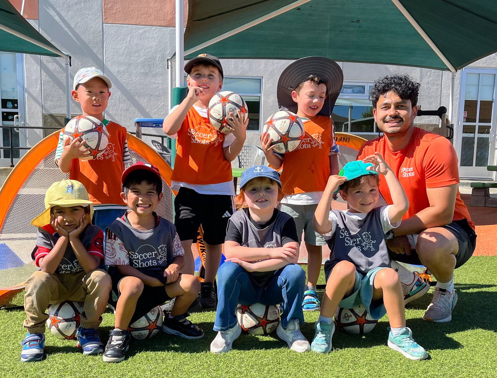 Starbright children playing soccer on the field