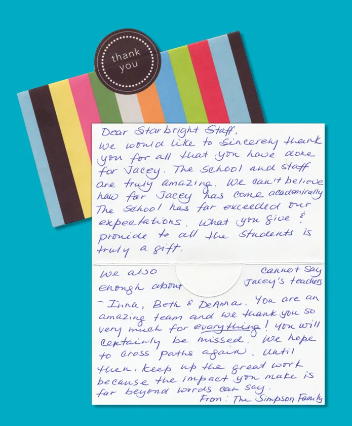 A handwritten family letter on a striped Starbright card